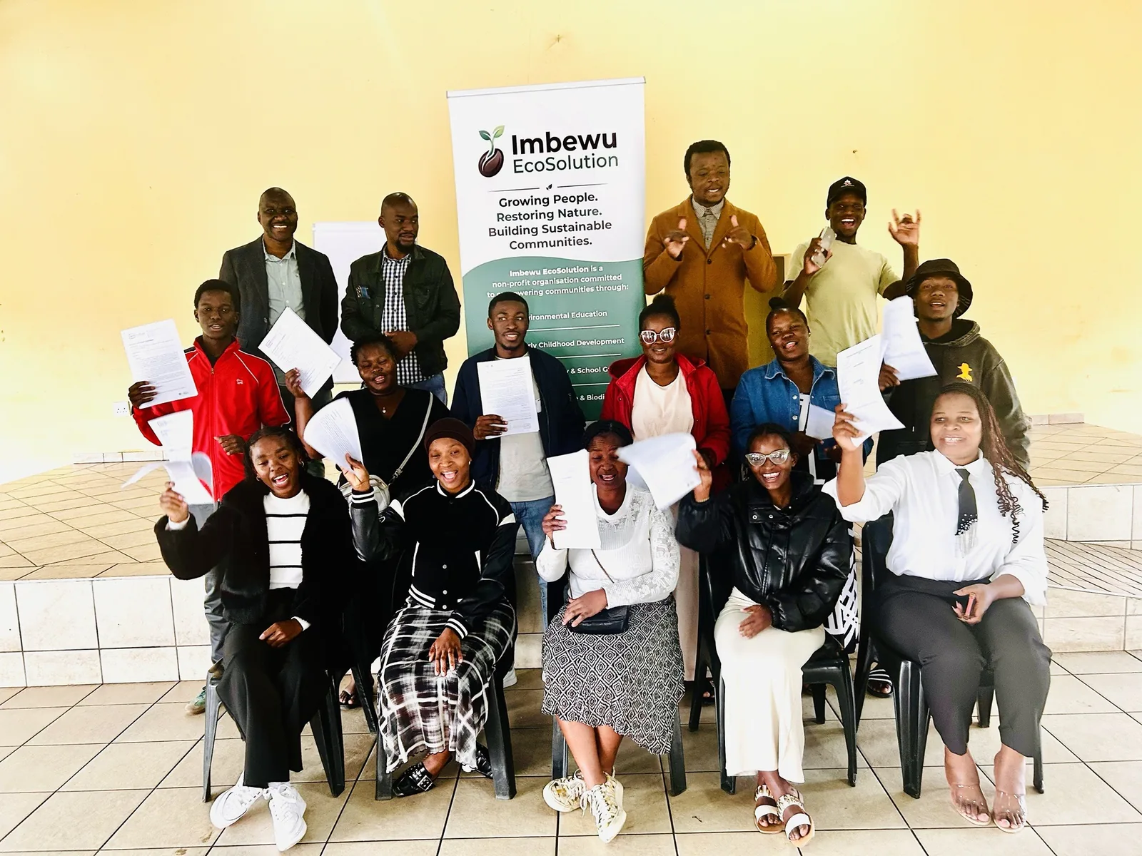 Community training participants with certificates